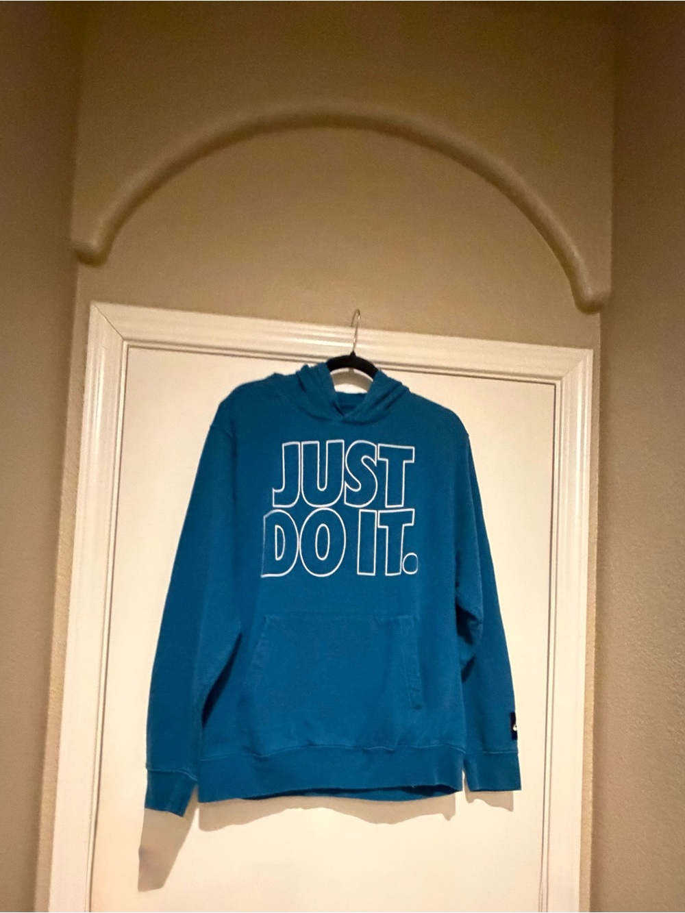 Nike Teal Blue Pullover Hoodie with Bold White Outline Graphic